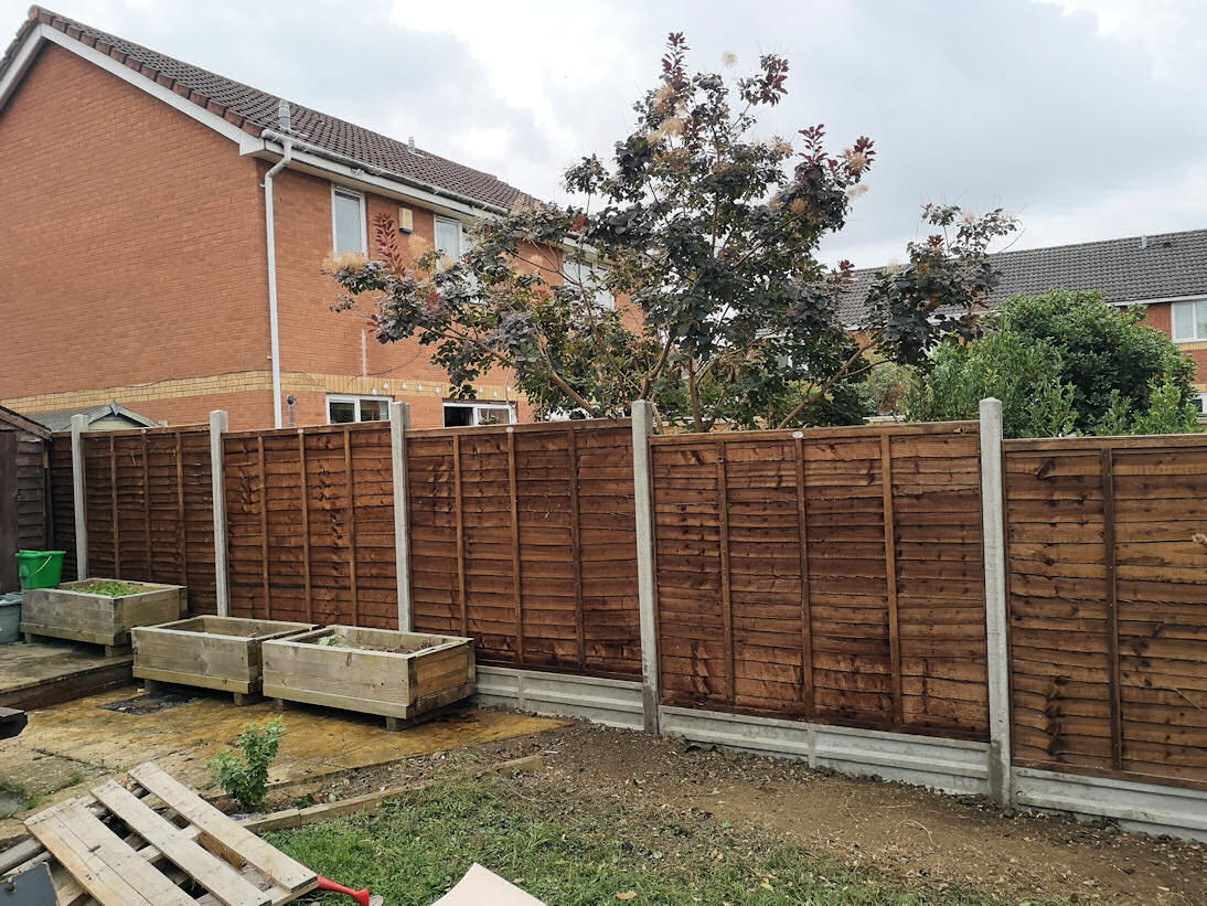 Concrete Fence With Gravel Boards