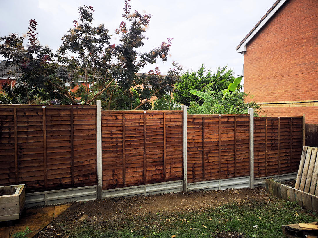 Overlap fence installed by C&K Building